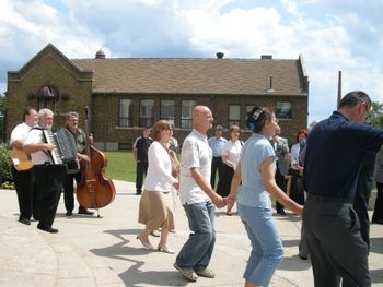 Kolo dancing in front of the church after the service
