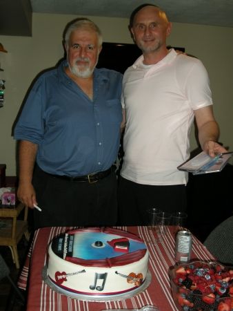 John and Djordjo (Graphic Designer) posing with CD Cake
