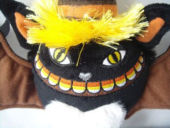 Candy Claws Plush Face Beautifully embroidered candy corn teeth!
