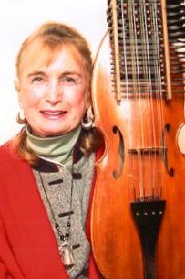 Ann Mayo Muir with her Nyckelharpa on which she composed tunes for her CD~Notes From Across The Sea
