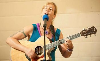 Kathy playing at Serenity Sisters retreat 2014
