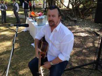 Yours truly playing the ceremony at Elle and Aaron Fiorelli's at Little Beach Pt Douglas looking serious
