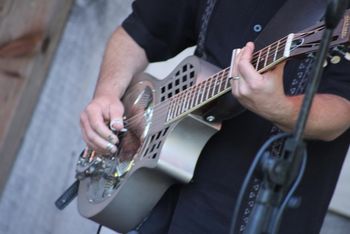 Jason Fickel with Dobrato guitar prototype Photo by Gail Ginther
