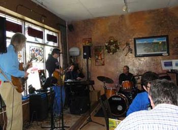 The band at Woodstock Cafe: Mark Lysher on bass, Scott Taylor on drums, Mac Walter on guitar.
