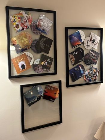 CDs displayed on the wall
