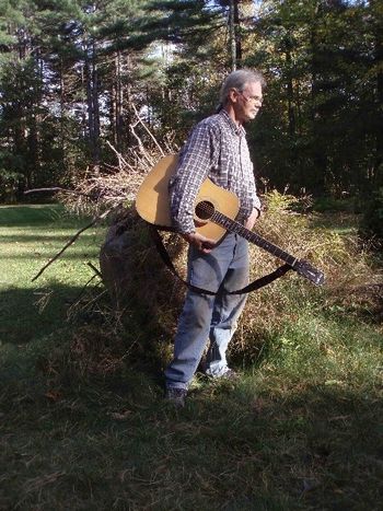 standing by the oak root ball
