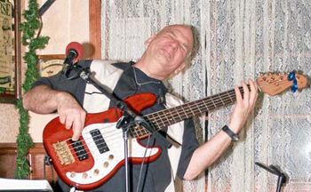 w/ my go-to Squire Protone 5-string fretted bass
