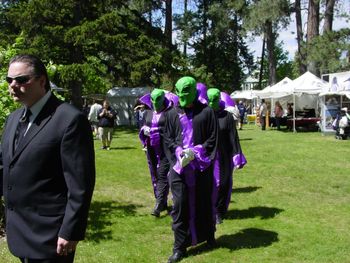 Adam C. Sharp (Man in Black) with Aliens
