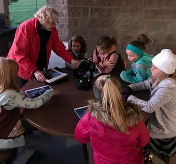 IRENE BARON TEACHING ASTRONOMY TO GIRL SCOUTS
