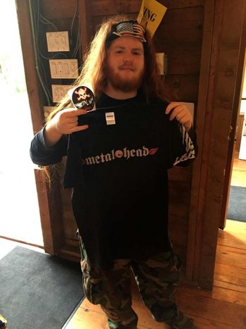 A Prize Winner With A Shirt From Metal Motivation.
