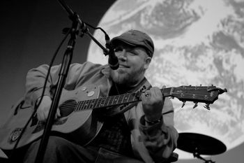 RR_at_Help_Haiti_Heal_Benefit_White_Horse_Black_Mountain_NC_with_Earth_Background_BW
