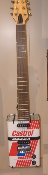 2009 Ramkie made by the Khoisan people of South Africa. It has guitar parts attached to a can
