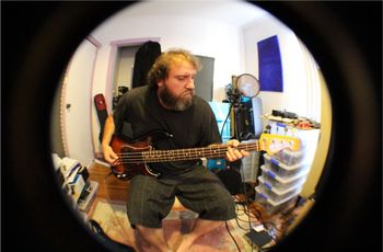 Dave Heald Australian Bass Player Dave Heald in a recording studio on his Fender precision Bass
