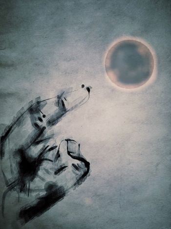 Finger_pointing_to_the_Moon
