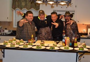 DSC_0047 Nick Huffman, Scott Green, Chef Kern and Hal finishing up Chef Kern's cooking segment.
