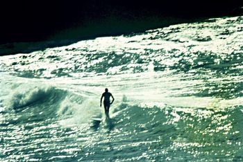 Allan Matheson on an outgoing whananaki bar.... you can just about see the rip going out...Xmas 1965
