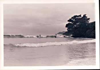 Tui or Mike Cooney playing with a nice little wave in the corner at Waipu ...Xmas '1962 how unspoilt does that look....awesome days...
