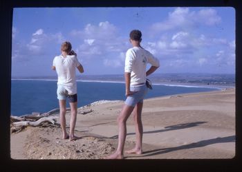 up on top of those massive Ahipara sandhills.. Paddy Kelly & Murray Jacks having an awesome time at Shipwreck Bay...summer of '67.....in '67 we found a human skeleton on these dunes ...with a pair of scissors stuck in a rib and rosary beads around his neck...we figured an 18th century missionary!!!!!!
