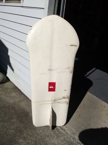 the Kings neighbour...Mr Jones built this body board in '64.. Trev dragged it out of his garage in 2012 and took this photo of it ....made the whole thing himself in '63-64..even blew his own blank...amazing....Trev just put the sticker on it recently!!
