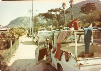 Mike and Jack going for a surf  in the Indian Ocean......Danger reef...Muizemberg....Capetown SA
