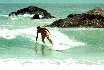 great shot of Tim...beautifuly positioned power turn... shades of Barry Kaniapuni......got a warm summer of '67 feel about it!!...
