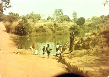 African washing clothes
