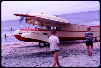 Fred Ladd's plane on a beach Capt ladd 1964

