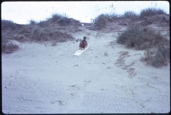 some old bloke arrived and took a very careful ride down a tiny slope....ha!! Tui Ocean Bch..few years later on upside-down surfboard!!...
