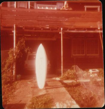 Colin Lowe building boards.....at home Parua Bay.....Toni looking on
