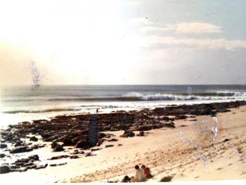 another beautiful empty day at J Bay ...summer of 1970 A good South African friend of mine 'Spange' Andy Spangler....has been living and building boards here now for a couple of years....not a bad spot to live!!!....mind you ..cold in the winter....
