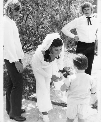 Phil looking like Wyatt Earp.... Paula getting flowers from my nephew clyde.....
