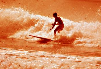 Tui at Waipu...summer of '65. With those Hawaiian flowery boardshorts on......longer boardshorts were just starting to come in!!!
