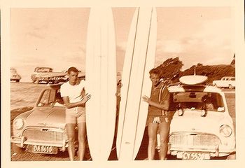 Dicky Robinson and friend ..Waipu Cove 1964 Dick would have been about 17 now and was doing a carpentry apprenticeship with Jack Guy builders...hence the mini and the new board!!
