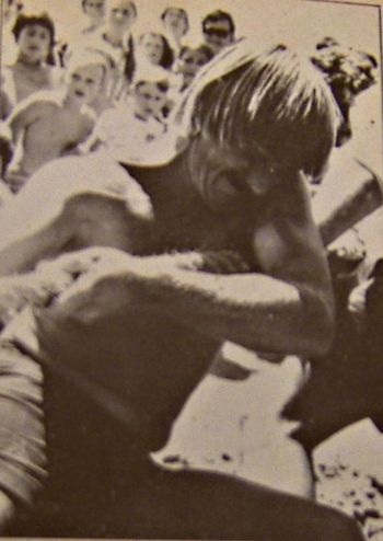 and we were all starting to get that blonde surfy mop too around '68 My bro..Phil Cooney...tug of war at the Ruakaka surf club in '68.....surfers were recognized in those days also by their sun bleached blonde hair....some had a little liquid help as well!!! ..Ha!
