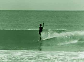 Malcolm about to get wet..... but saluting 'Huey' on his way down..Ha!.....clean classic warm 'Sandy's on a summer morning in '67.....in Dec '67 Malcolm took out the overall winners prize in the most recent Tatahi contest...followed by Tony Kivell & Colin Lowe...well done Malcolm...
