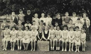 1955 Whg primary top left Dick Robinson Our meek and mild Dicky...either yelling at the teacher to hurry up ....or yawning!......they were such innocent fun days weren't they!!..
