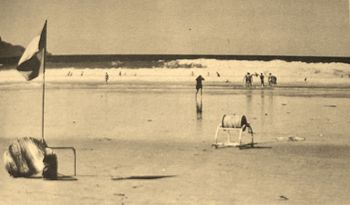 Ruakaka 1963...low tide and a quite a nice sized swell running ...we would have been surfing that swell out in front of the clubhouse at first light when it was glassy this same day...was awesome fun!! probably Brett, Mike King, myself and Wayne Hutton.......most surfclubs around NZ had the early morning malibu crew!
