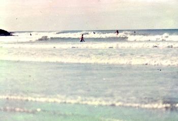 Took a trip to Ahipara ...summer of '65 Just us guys in the water ....Brett Knight walking out ..Phil Cooney on closest wave...cant remember who else...maybe Wayne Hutton.............had some beautiful shaped waves that weekend!!
