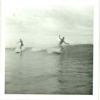 Johnny Ayton looking very polished ...trimming on the nose...summer of '66 'Dak' McDonald following up behind.....Waipu Cove
