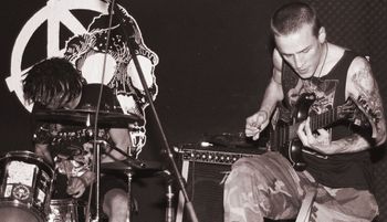 Live @ the Sleeping Turtle, New Paltz, New York, September 18th, 1996. Eastern Front Tour. Photo by and courtesy of Chris Boarts Larson © 1996. http://www.slugandlettuce.net
