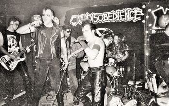 Live @ the Bomb Shelter, Minneapolis, October 31st, 1996. Evil Disobedience! Photo by and courtesy of Molly Howard.
