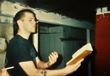 Band practice, Detroit, Michigan, 1995. In keeping with traditions passed down from his Irish ancestors, M.F. Delicious regales with tales of extremely high adventure and ruination in the motor city.
