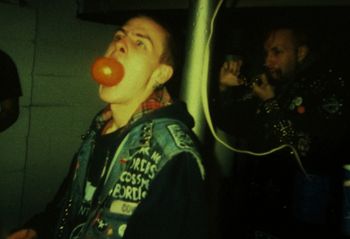 Band practice, 1995. #2 Momentarily embodying the ideal of health conscious Hardcore, Spanky Lux gets fired up with a nutritious snack.

