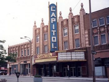 The Capitol Theater, 142 East 2nd Street, Flint, Michigan. The Capitol was sometimes referred to as the "Fallout Shelter," after the actual fallout shelter under the theater where gigs occasionally took place. It hosted a wide variety of underground rock shows during the late 80's and early 90's.
