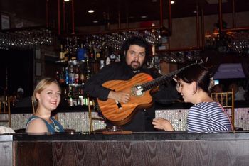 Encore NYC serenading some chicas at the Encore restaurant in Brooklyn, NYC - July 28, 2016 (photo credit: Victor Tarassov
