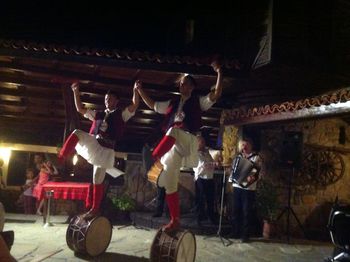 Traditional Bulgarian Dancers put on a show. Sozopol Bulgaria. Traditional Bulgarian Dancers put on a show.
