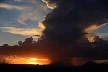 Sunset, blue sky, and a storm
