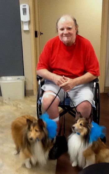 Uncle Troy w/Barb Moore's therapy Starlight dogs
