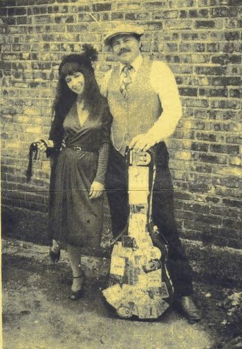 We called ourselves "The Floozie and the Dude" Taken in a gritty alley in Chicago with Poor Howard Stith.  Loved playing piano with H. on dobro!  Loved backing him up on "Jack's Red Cheetah."  Photo by Billy Prewitt
