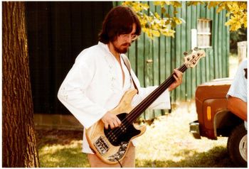 Ancient History #4 - My Dad (R.I.P.) shot this at the party after my first wedding at which the Kokomo Bros showed up and we played Bluegrass for the gathering. It was about 99 F. in the shade that day. Man oh man, I wish I still had that Music Man bass!!
